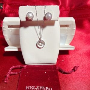 Brand new Silver earring and necklace